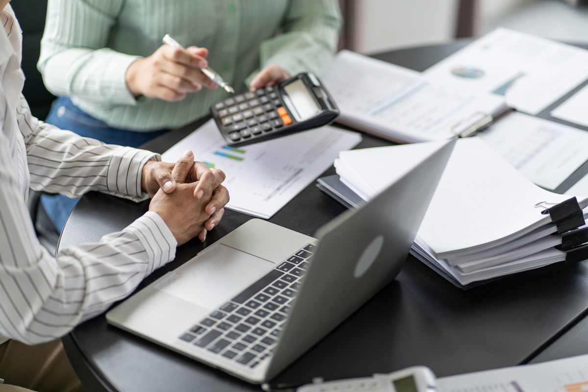 Auditor or internal revenue service staff, Business women checking annual financial statements of company. Audit Concept.